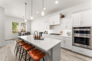 Discover timeless elegance in this meticulously crafted home on River Birch Golf Course in Idaho - for sale on GolfHomes.com, golf home, golf lot
