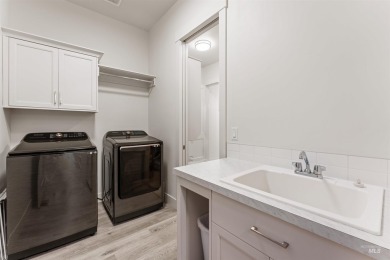 Discover timeless elegance in this meticulously crafted home on River Birch Golf Course in Idaho - for sale on GolfHomes.com, golf home, golf lot