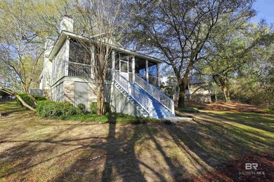 Quiet woods. Inviting porches. Thoughtful design. Set in the on Steelwood Country Club in Alabama - for sale on GolfHomes.com, golf home, golf lot