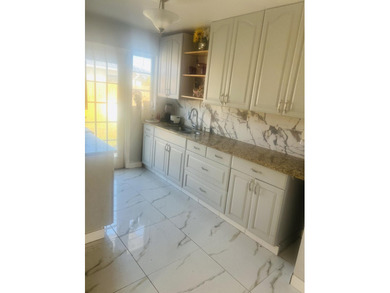 2/1 CBS NO HOA home in Port St. Lucie featuring a screened in on Club Med Sandpiper in Florida - for sale on GolfHomes.com, golf home, golf lot