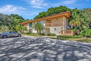 Rare first floor corner unit in Golf Villas, beautifully updated on PGA National Golf Club in Florida - for sale on GolfHomes.com, golf home, golf lot