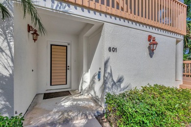 Rare first floor corner unit in Golf Villas, beautifully updated on PGA National Golf Club in Florida - for sale on GolfHomes.com, golf home, golf lot