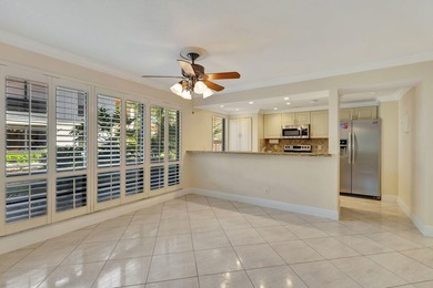 Rare first floor corner unit in Golf Villas, beautifully updated on PGA National Golf Club in Florida - for sale on GolfHomes.com, golf home, golf lot
