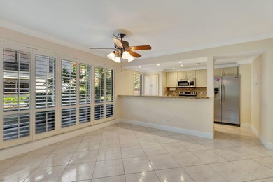 Rare first floor corner unit in Golf Villas, beautifully updated on PGA National Golf Club in Florida - for sale on GolfHomes.com, golf home, golf lot