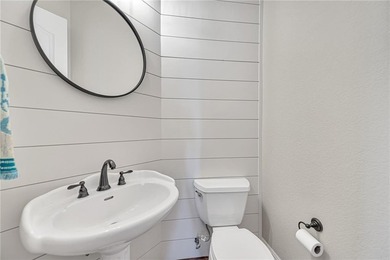 Welcome home to this inviting corner-lot gem in beautiful Shadow on Shadow Valley Country Club in Arkansas - for sale on GolfHomes.com, golf home, golf lot