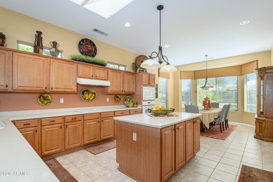 AS YOU ENTER THIS BEAUTIFUL ASHBURY THE SENSATIONAL VIEWS OF THE on Cimarron Golf Club in Arizona - for sale on GolfHomes.com, golf home, golf lot