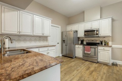 Stunning, well-maintained townhome nestled on the 14th fairway on  in Florida - for sale on GolfHomes.com, golf home, golf lot