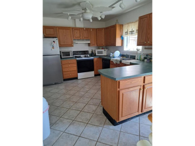 Great location for this well maintained 3 bedroom home with 2 on Captains Cove Golf and Yacht Club in Virginia - for sale on GolfHomes.com, golf home, golf lot