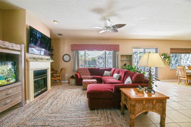 RARELY AVAILABLE POOL (SALTWATER W/HOT TUB) HOME IN WONDERFUL on Eagle Ridge At Spruce Creek Country Club in Florida - for sale on GolfHomes.com, golf home, golf lot
