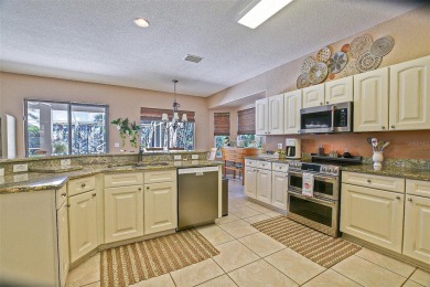 RARELY AVAILABLE POOL (SALTWATER W/HOT TUB) HOME IN WONDERFUL on Eagle Ridge At Spruce Creek Country Club in Florida - for sale on GolfHomes.com, golf home, golf lot