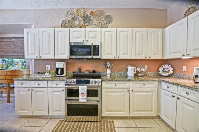 RARELY AVAILABLE POOL (SALTWATER W/HOT TUB) HOME IN WONDERFUL on Eagle Ridge At Spruce Creek Country Club in Florida - for sale on GolfHomes.com, golf home, golf lot