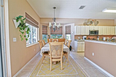 RARELY AVAILABLE POOL (SALTWATER W/HOT TUB) HOME IN WONDERFUL on Eagle Ridge At Spruce Creek Country Club in Florida - for sale on GolfHomes.com, golf home, golf lot
