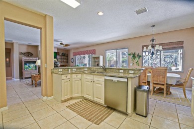 RARELY AVAILABLE POOL (SALTWATER W/HOT TUB) HOME IN WONDERFUL on Eagle Ridge At Spruce Creek Country Club in Florida - for sale on GolfHomes.com, golf home, golf lot