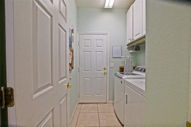 RARELY AVAILABLE POOL (SALTWATER W/HOT TUB) HOME IN WONDERFUL on Eagle Ridge At Spruce Creek Country Club in Florida - for sale on GolfHomes.com, golf home, golf lot