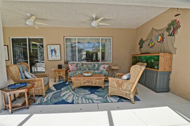 RARELY AVAILABLE POOL (SALTWATER W/HOT TUB) HOME IN WONDERFUL on Eagle Ridge At Spruce Creek Country Club in Florida - for sale on GolfHomes.com, golf home, golf lot