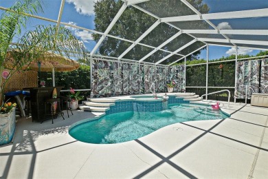 RARELY AVAILABLE POOL (SALTWATER W/HOT TUB) HOME IN WONDERFUL on Eagle Ridge At Spruce Creek Country Club in Florida - for sale on GolfHomes.com, golf home, golf lot