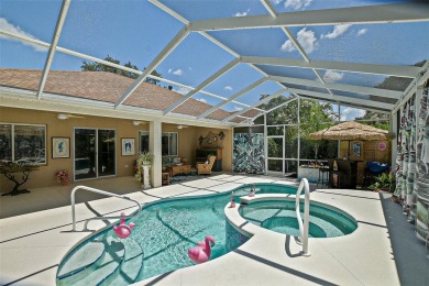 RARELY AVAILABLE POOL (SALTWATER W/HOT TUB) HOME IN WONDERFUL on Eagle Ridge At Spruce Creek Country Club in Florida - for sale on GolfHomes.com, golf home, golf lot