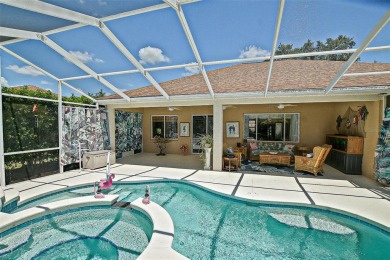 RARELY AVAILABLE POOL (SALTWATER W/HOT TUB) HOME IN WONDERFUL on Eagle Ridge At Spruce Creek Country Club in Florida - for sale on GolfHomes.com, golf home, golf lot