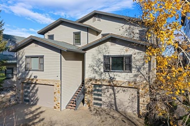 Tucked at the end of a cul-de-sac, this private townhome on Rollingstone Ranch Golf Club in Colorado - for sale on GolfHomes.com, golf home, golf lot