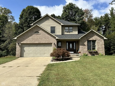 Welcome to this beautiful two-story home with 3 bedrooms and 2.5 on Foxcliff Golf Club in Indiana - for sale on GolfHomes.com, golf home, golf lot