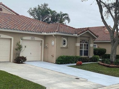 This beautiful home is a move-in ready, remodeled and very clean on The Links At Boynton Beach - The Family Course in Florida - for sale on GolfHomes.com, golf home, golf lot