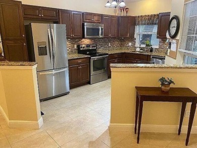 This beautiful home is a move-in ready, remodeled and very clean on The Links At Boynton Beach - The Family Course in Florida - for sale on GolfHomes.com, golf home, golf lot