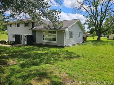 Updated 4 bedroom, 2-1/2 bath home on a beautiful corner lot! on Triple Creek Golf Course in Missouri - for sale on GolfHomes.com, golf home, golf lot