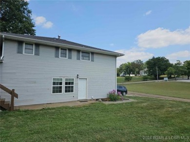 Updated 4 bedroom, 2-1/2 bath home on a beautiful corner lot! on Triple Creek Golf Course in Missouri - for sale on GolfHomes.com, golf home, golf lot