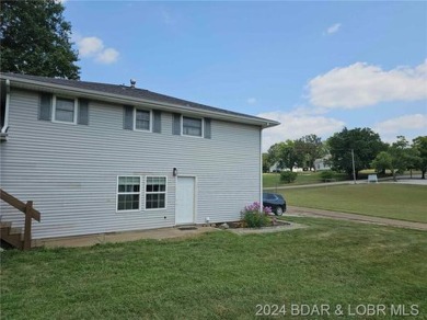 Updated 4 bedroom, 2-1/2 bath home on a beautiful corner lot! on Triple Creek Golf Course in Missouri - for sale on GolfHomes.com, golf home, golf lot