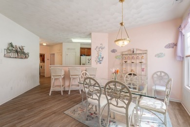 Discover the upbeat charm of this whimsical first-floor condo on Bay Creek Golf Club in Virginia - for sale on GolfHomes.com, golf home, golf lot