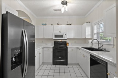 Welcome to this charming 2 bedroom, 2 bathroom 1st floor condo on Barefoot Resort and Golf Club  in South Carolina - for sale on GolfHomes.com, golf home, golf lot