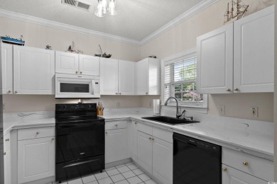 Welcome to this charming 2 bedroom, 2 bathroom 1st floor condo on Barefoot Resort and Golf Club  in South Carolina - for sale on GolfHomes.com, golf home, golf lot