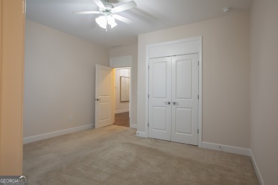 Tucked away on a wooded lot in Cresswind at Lake Lanier, a on Lanier Island Legacy Golf Couorse in Georgia - for sale on GolfHomes.com, golf home, golf lot