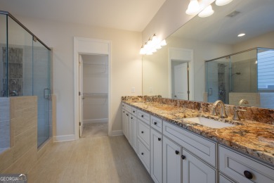 Tucked away on a wooded lot in Cresswind at Lake Lanier, a on Lanier Island Legacy Golf Couorse in Georgia - for sale on GolfHomes.com, golf home, golf lot