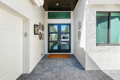 Stunning, fully renovated single story residence available in on Frenchmans Creek Country Club in Florida - for sale on GolfHomes.com, golf home, golf lot