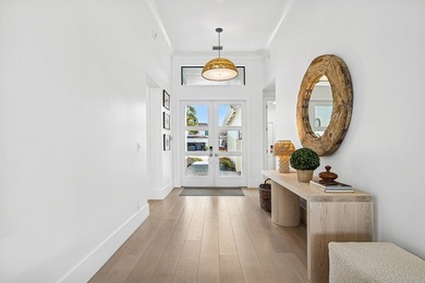 Stunning, fully renovated single story residence available in on Frenchmans Creek Country Club in Florida - for sale on GolfHomes.com, golf home, golf lot