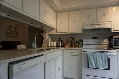 Beautifully furnished ground floor 2 bed / 2 bath Condo located on Isla Del Sol Yacht and Country Club in Florida - for sale on GolfHomes.com, golf home, golf lot