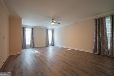 Tucked away on a wooded lot in Cresswind at Lake Lanier, a on Lanier Island Legacy Golf Couorse in Georgia - for sale on GolfHomes.com, golf home, golf lot