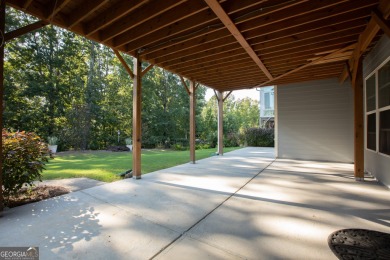 Tucked away on a wooded lot in Cresswind at Lake Lanier, a on Lanier Island Legacy Golf Couorse in Georgia - for sale on GolfHomes.com, golf home, golf lot