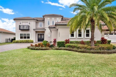 Nestled in the Eagle Creek golf community, this exquisite on Eagle Creek Golf Club in Florida - for sale on GolfHomes.com, golf home, golf lot