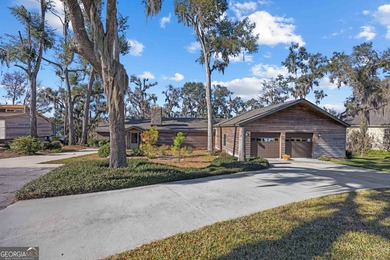 Discover this beautifully preserved mid-century lake house on Francis Lake Golf Club in Georgia - for sale on GolfHomes.com, golf home, golf lot