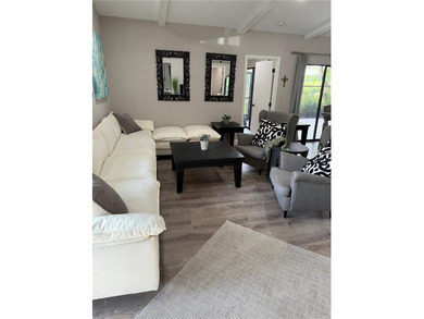 VERY DESIRABLE GATED COMMUNITY OF EAST LAKE WOODLANDS, CORNER on East Lake Woodlands Country Club in Florida - for sale on GolfHomes.com, golf home, golf lot