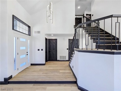 ** ONE OF A KIND BACKYARD SITS ON A LAKE AND TWO GOLF COURSE on Painted Desert Golf Club in Nevada - for sale on GolfHomes.com, golf home, golf lot