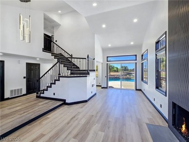 ** ONE OF A KIND BACKYARD SITS ON A LAKE AND TWO GOLF COURSE on Painted Desert Golf Club in Nevada - for sale on GolfHomes.com, golf home, golf lot