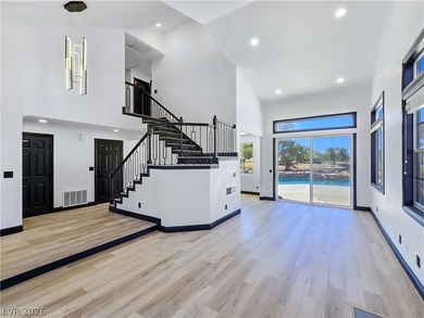 ** ONE OF A KIND BACKYARD SITS ON A LAKE AND TWO GOLF COURSE on Painted Desert Golf Club in Nevada - for sale on GolfHomes.com, golf home, golf lot