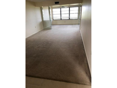 BRIGHT 2BEDROOM/2BATH FORTH FLOOR PENTHOUSE END UNIT OFFERS on Bear Lakes Country Club in Florida - for sale on GolfHomes.com, golf home, golf lot