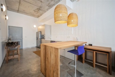 Built in 2005, Meridian Lofts was developed by Flagler Holding on Miami Beach Golf Club in Florida - for sale on GolfHomes.com, golf home, golf lot