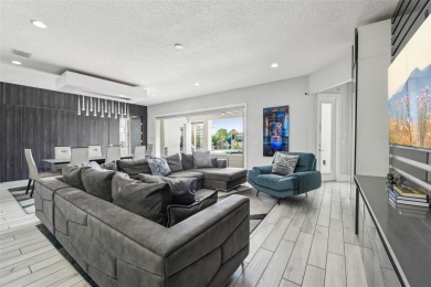 Welcome to 13136 Alderley Drive - a luxurious 5-bedroom, 5-bath on Eagle Creek Golf Club in Florida - for sale on GolfHomes.com, golf home, golf lot