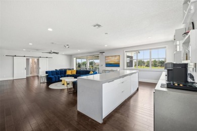 Welcome to 13136 Alderley Drive - a luxurious 5-bedroom, 5-bath on Eagle Creek Golf Club in Florida - for sale on GolfHomes.com, golf home, golf lot