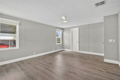 Welcome to this beautifully remodeled 2 BEDROOM 2 BATH home on Zellwood Station Country Club in Florida - for sale on GolfHomes.com, golf home, golf lot